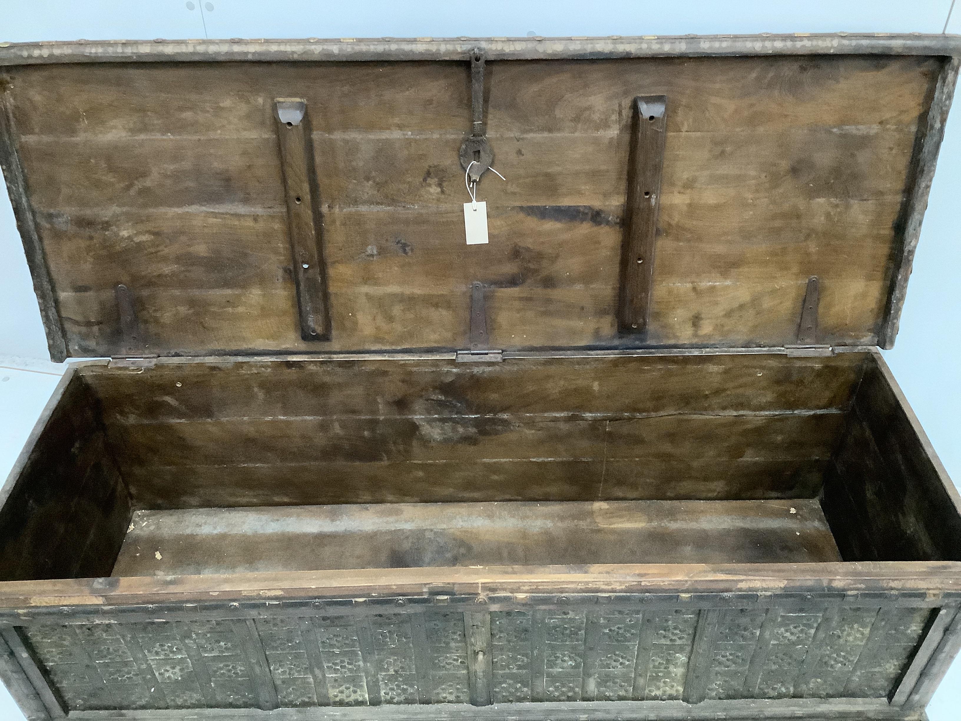 A Zanzibar style brass mounted hardwood coffer, width 142cm, depth 51cm, height 49cm